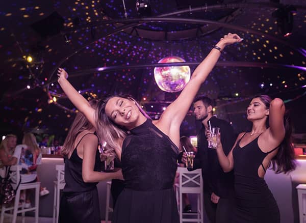 Crowd dancing on a packed club dancefloor in Hampshire