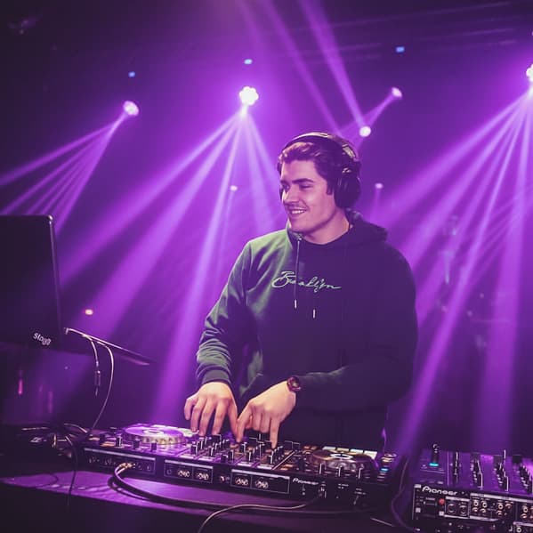 DJ Gianni playing on the decks in a club in Southampton